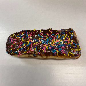 Chocolate Iced Long John Sprinkles Donut