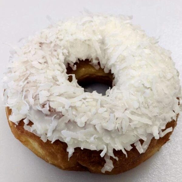 Vanilla iced cake donut with coconut
